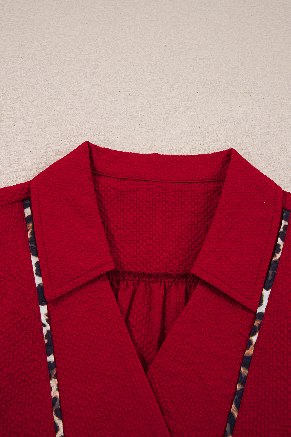 The Holly & Spice Leopard Trim Blouse