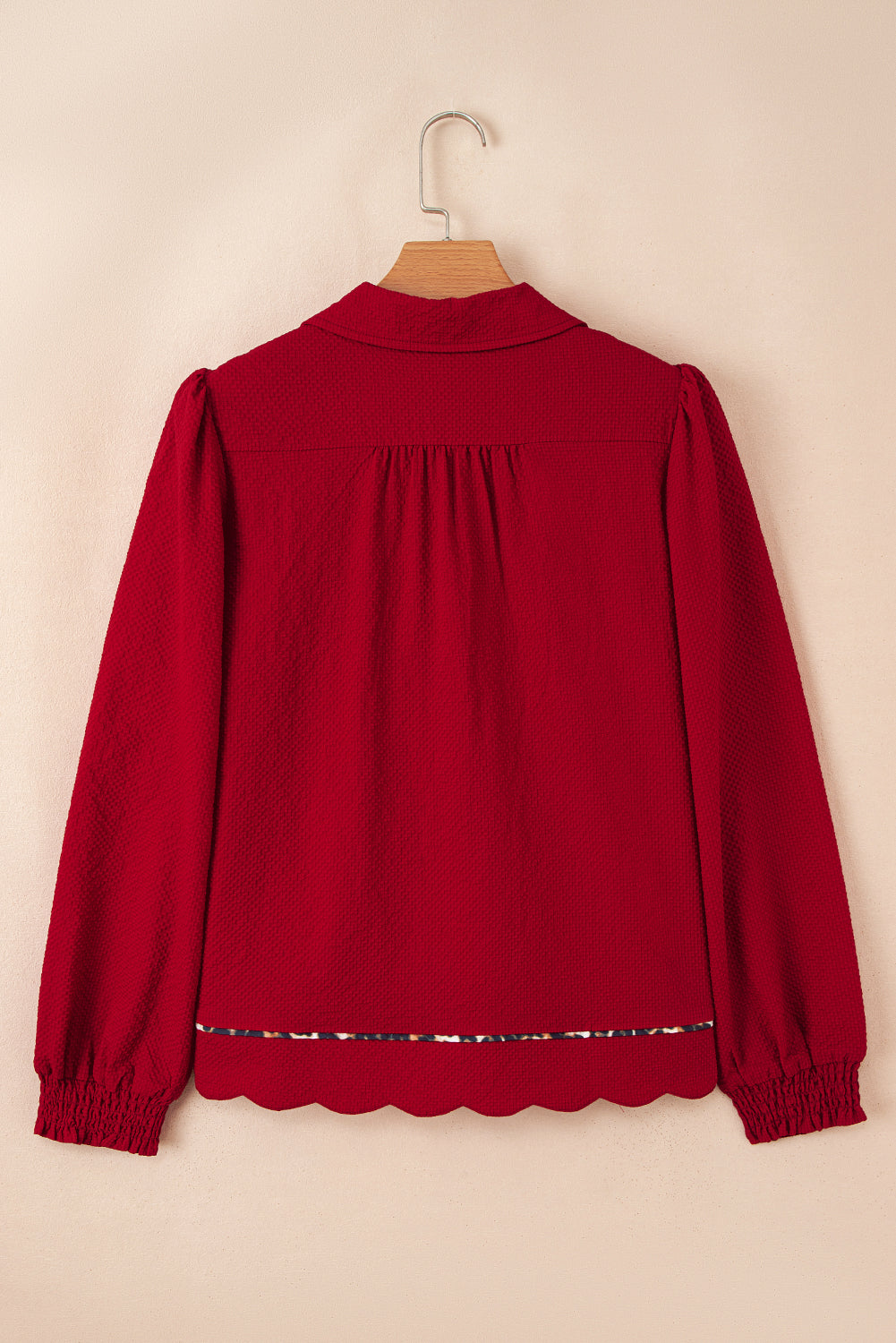 The Holly & Spice Leopard Trim Blouse