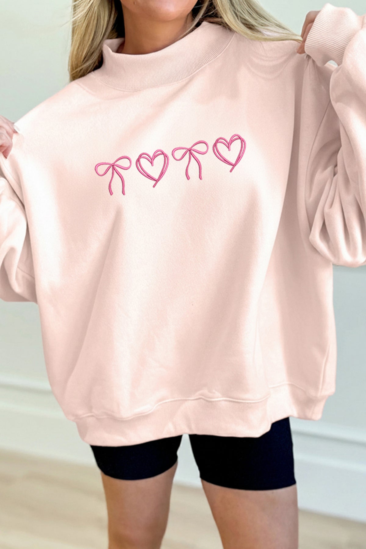 Apricot Pink Valentines Bow Heart Embroidered Mock Neck Sweatshirt
