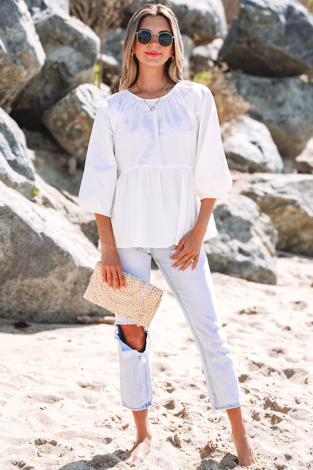 The Cloud Nine Peplum Blouse