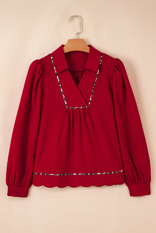 The Holly & Spice Leopard Trim Blouse